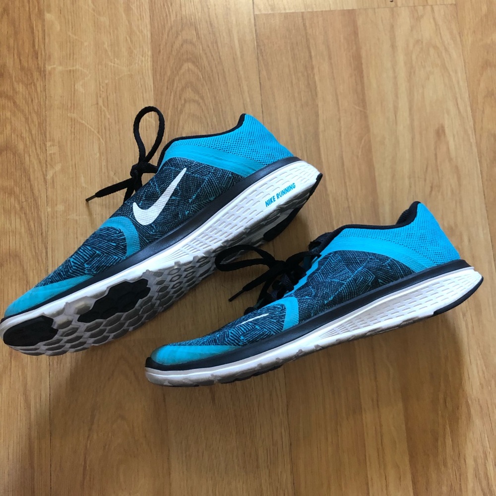 Blue tone nike athletic running shoes